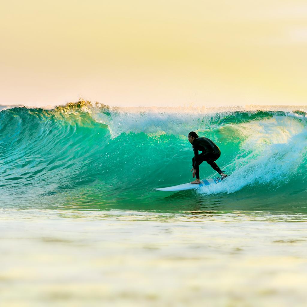 Man surfing on the beach in Queensland
